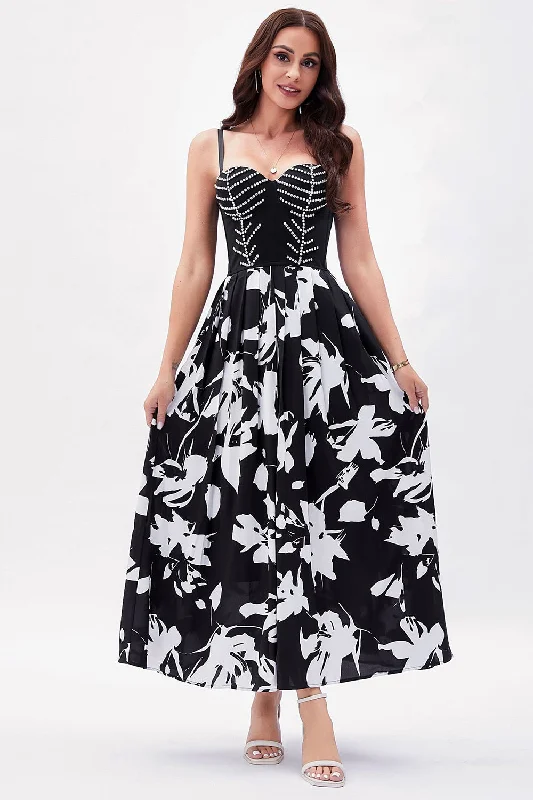 Dresses with Metallic Sequined Bodice and Chiffon Skirt for Ladies' Glamorous and Flirty LookBlack White Flower Printed A-Line Spaghetti Straps Party Dress