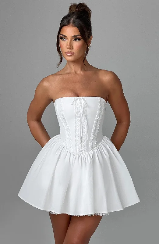 "Pleated dresses for women with a graceful movement"Evie Mini Dress - Ivory