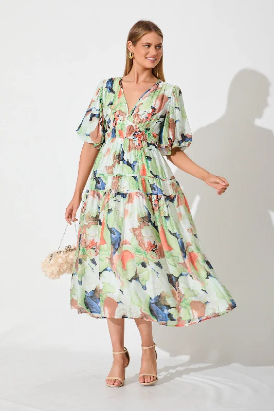 Puff - sleeve midi dress for a feminine and voluminous styleAmalie Midi Dress In Green And Multi Floral Puff - sleeve midi dress for a feminine and voluminous styleAmalie Midi Dress In Green And Multi Floral