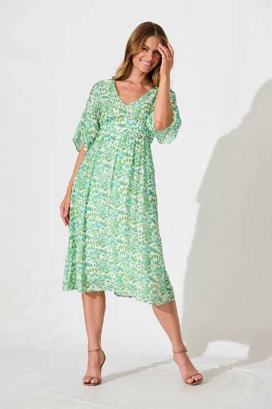 Midi dress for a countryside getaway for a laid - back and rustic lookAngie Midi Dress In Green Floral Print Midi dress for a countryside getaway for a laid - back and rustic lookAngie Midi Dress In Green Floral Print