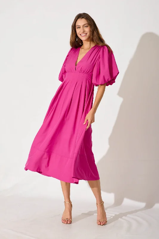 Midi dress for a date when styled with a cute top and heelsDaydreamer Midi Dress In Magenta Midi dress for a date when styled with a cute top and heelsDaydreamer Midi Dress In Magenta