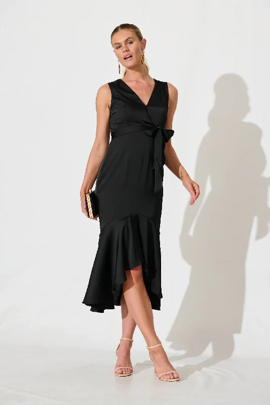 Puff - sleeve midi dress for a feminine and voluminous styleIn The Air Midi Dress In Black Puff - sleeve midi dress for a feminine and voluminous styleIn The Air Midi Dress In Black