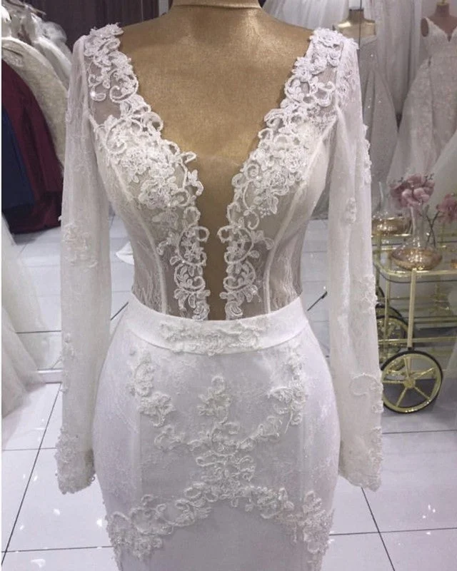 Lace - up back wedding dress for a customizable fitSheer Corset Mermaid Wedding Dress Long Sleeves Lace Appliques