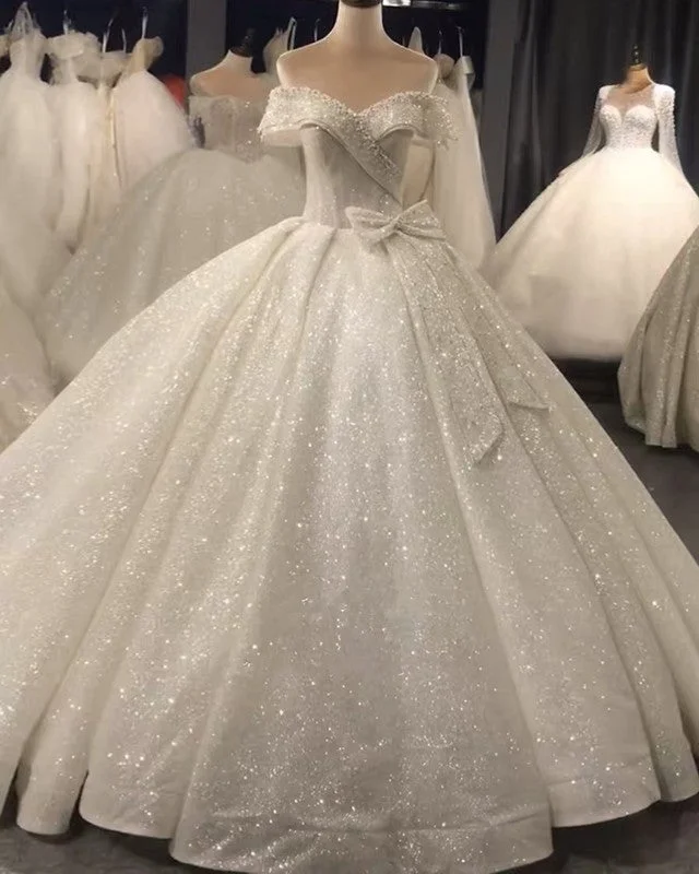 Quilted - fabric wedding dress for a unique textureBow Back Wedding Dress Sequins Ball Gown Off The Shoulder