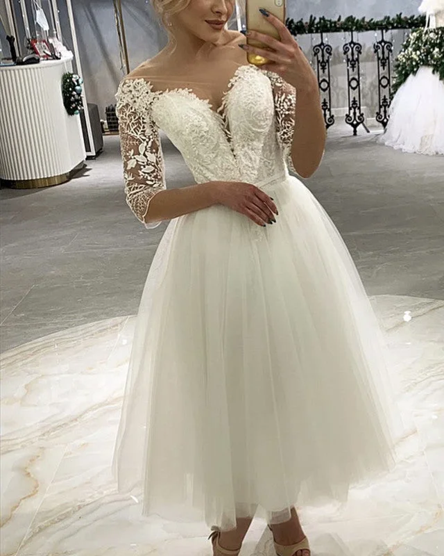Gemstone - embellished wedding dressTulle Tea Length Wedding Dress With Lace Sleeves
