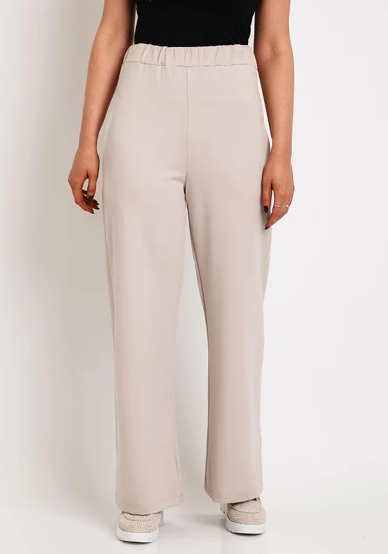 High waisted cargo wide leg pants for women in a practical and stylish styleD.e.c.k by Decollage Wide Leg Trouser, Beige High waisted cargo wide leg pants for women in a practical and stylish styleD.e.c.k by Decollage Wide Leg Trouser, Beige