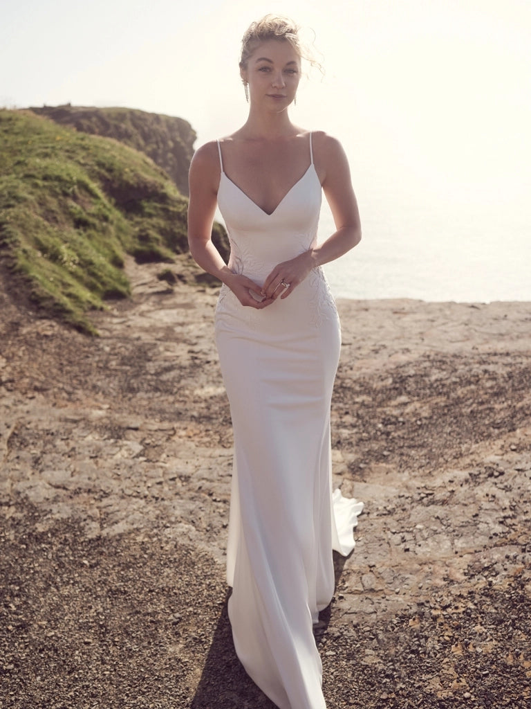 Fit - and - flare wedding dress with a big bowDionne