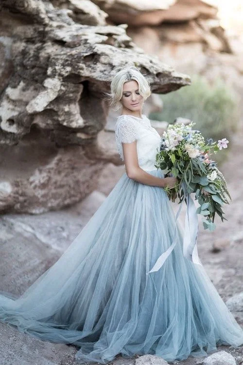 Cape - backed wedding dress for a dramatic entranceDusty Blue Tulle Wedding Dress with Removable Lace Top Cape - backed wedding dress for a dramatic entranceDusty Blue Tulle Wedding Dress with Removable Lace Top