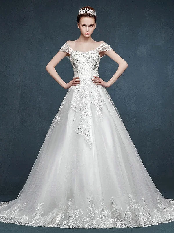 Cape - backed wedding dress for a dramatic entranceFairy Tale Lace A-line Wedding Dress with Cap Sleeves