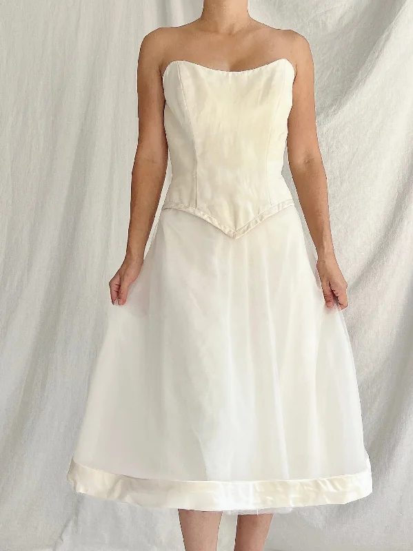 Antique - inspired lace wedding dress with long sleevesVintage Ulla Maija Silk Short Corset Dress - L/10-12