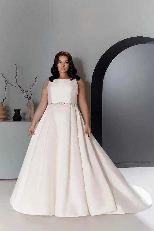 Feather - trimmed wedding dress for a romantic touchJared
