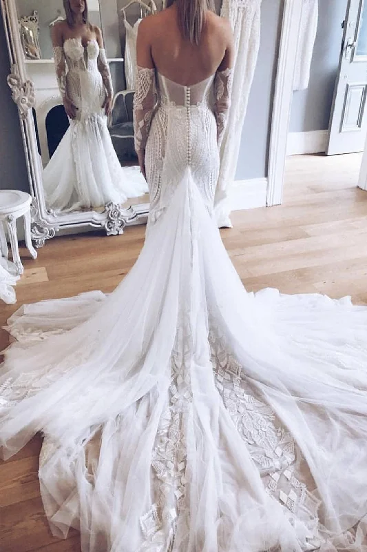 Fit - and - flare wedding dress with a big bowLong Strapless Chapel Train Mermaid White Wedding Dress Fit - and - flare wedding dress with a big bowLong Strapless Chapel Train Mermaid White Wedding Dress