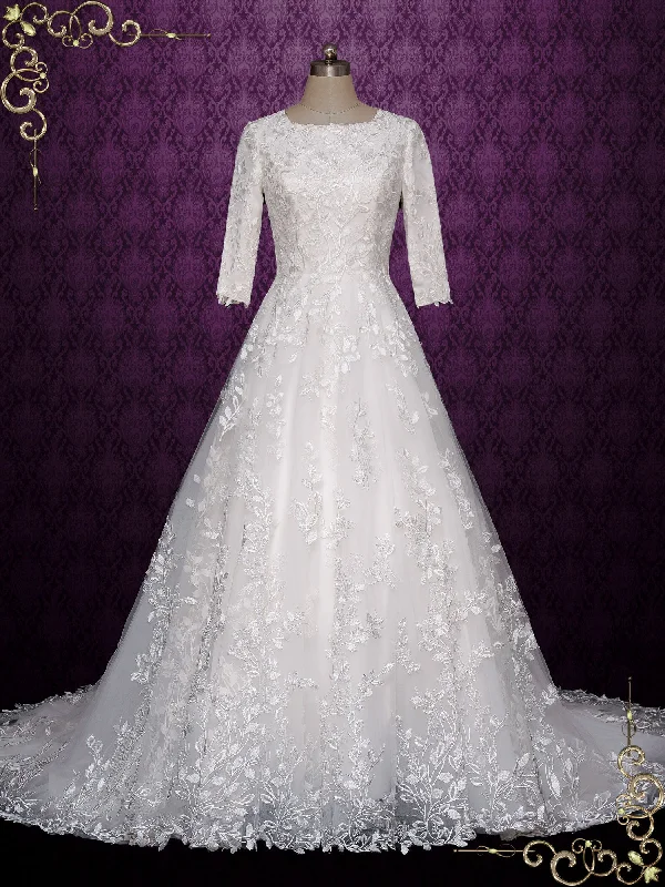 Peplum - style wedding dress for a flattering silhouetteModest Lace Ball Gown Wedding Dress MARGOT