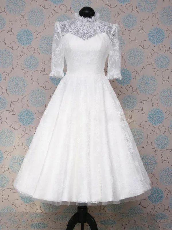 Exquisite hand - beaded wedding dressModest Tea Length Lace Wedding Dress with Sleeves Exquisite hand - beaded wedding dressModest Tea Length Lace Wedding Dress with Sleeves