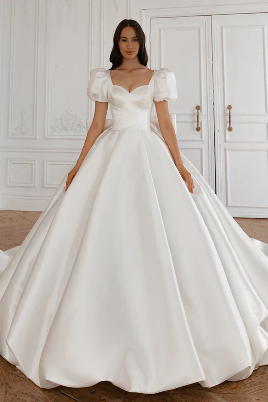 Modest - style wedding dress for a conservative brideSatin Long Train Wedding Gown with Puff Sleeves