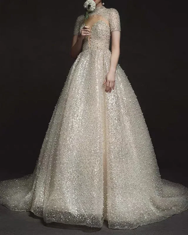 Cape - backed wedding dress for a dramatic entranceSequins Weddding Dress High Neck Cap Sleeves Cape - backed wedding dress for a dramatic entranceSequins Weddding Dress High Neck Cap Sleeves