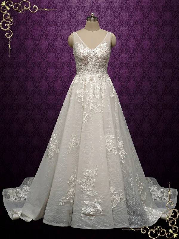 Dainty beaded wedding dress for a glamorous lookSparkly Lace Ball Gown with Open Back BRISA Dainty beaded wedding dress for a glamorous lookSparkly Lace Ball Gown with Open Back BRISA
