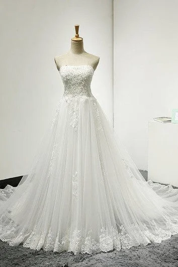 Silk - dupioni wedding dress for a luxurious feelStrapless Lace and Tulle Dress With Lace-Up Back