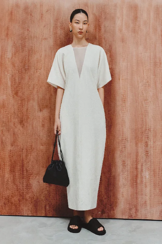 Dresses with Satin Trimmed Collar and Bow Back and Embroidered Skirt for Ladies' Classic and Glamorous LookCasey Cocoon Short Sleeved Foam Maxi Dress