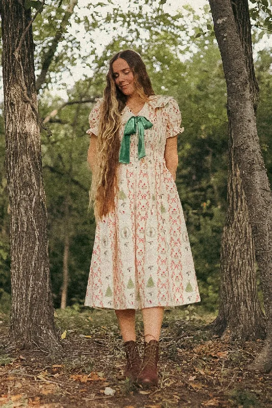 Dresses with Cut Out Details for Ladies' Bold and Fashionable LookYuletide Dress