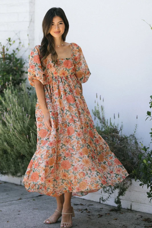 "Flash Sale: Grab Your Favorite Women's Dresses at Unbeatable Prices!"Estelle Babydoll Maxi Dress