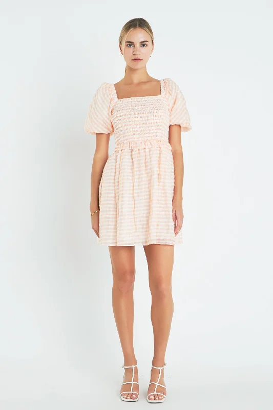 "White dresses for women for a fresh and clean look"Plaid Smocked Mini Dress